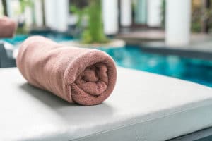 Pool towel on chair decoration around swimming pool
